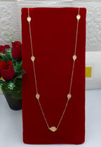 Radiant Gold-Tone Long Station Necklace with Textured Leaf Motifs