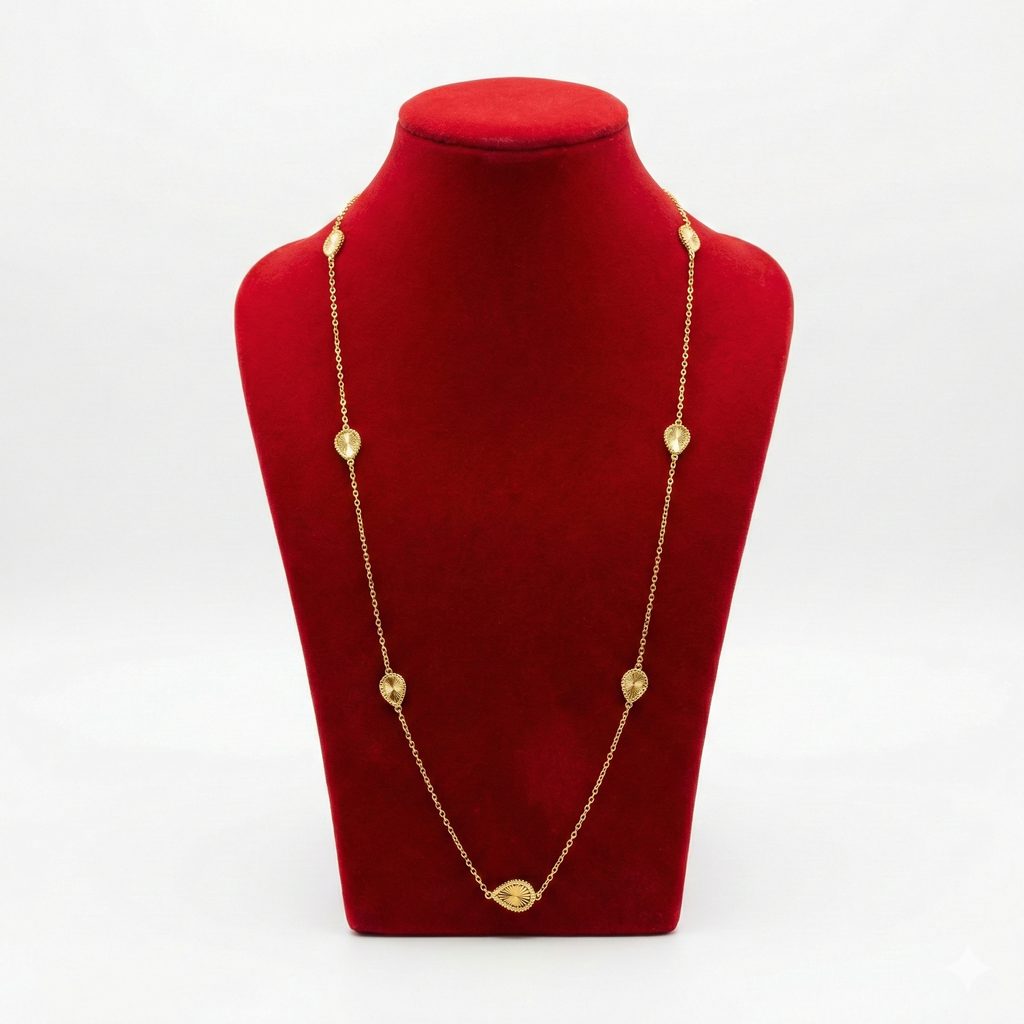 Radiant Gold-Tone Long Station Necklace with Textured Leaf Motifs
