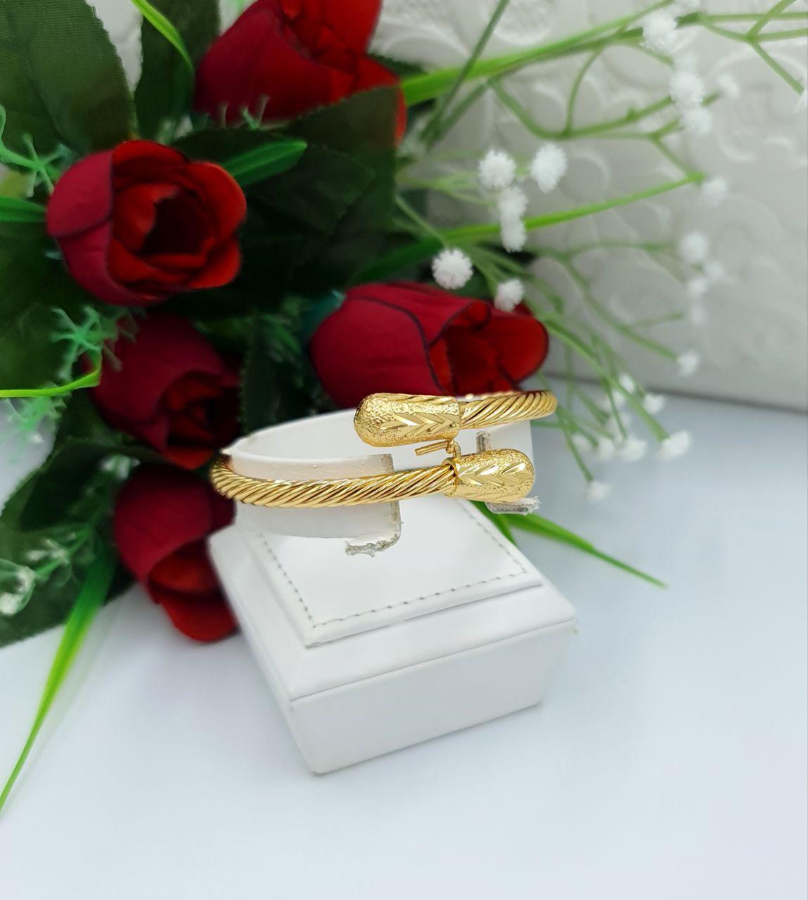Elegant Twisted Cable Gold-Tone Cuff Bracelet
